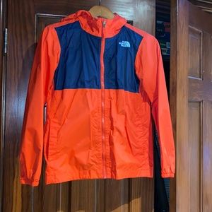 North Face boys large orange and navy rain jacket/ windbreaker.